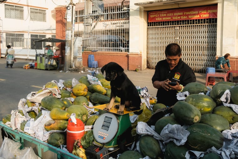Street photograph of Saigon by Adrien Jean