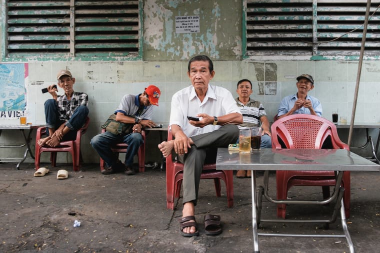 Street photograph of Saigon by Adrien Jean