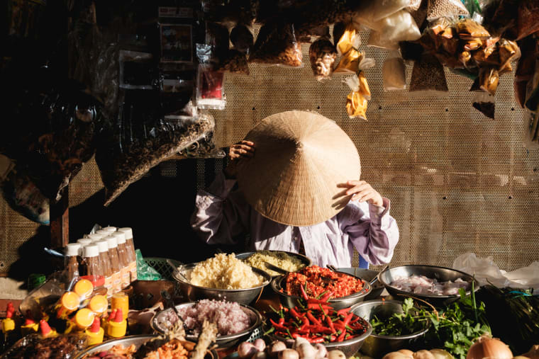 Street photograph of Saigon by Adrien Jean