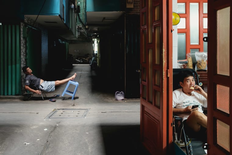 Street photograph of Saigon by Adrien Jean
