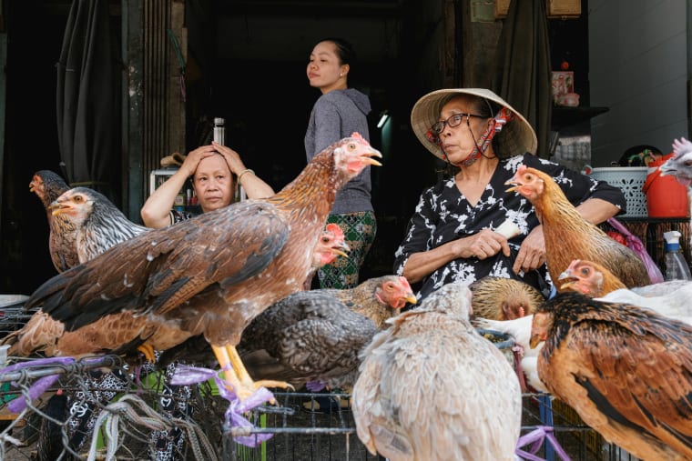 Street photograph of Saigon by Adrien Jean