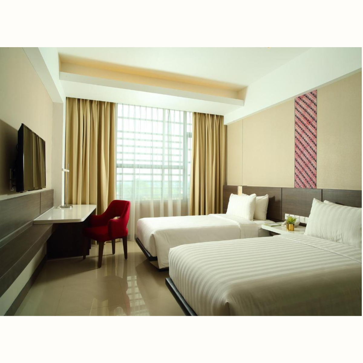Kamar elegan Hotel Santika Premiere