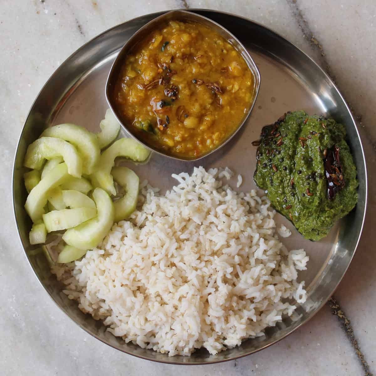 A clean plated meal with vegetables and rice