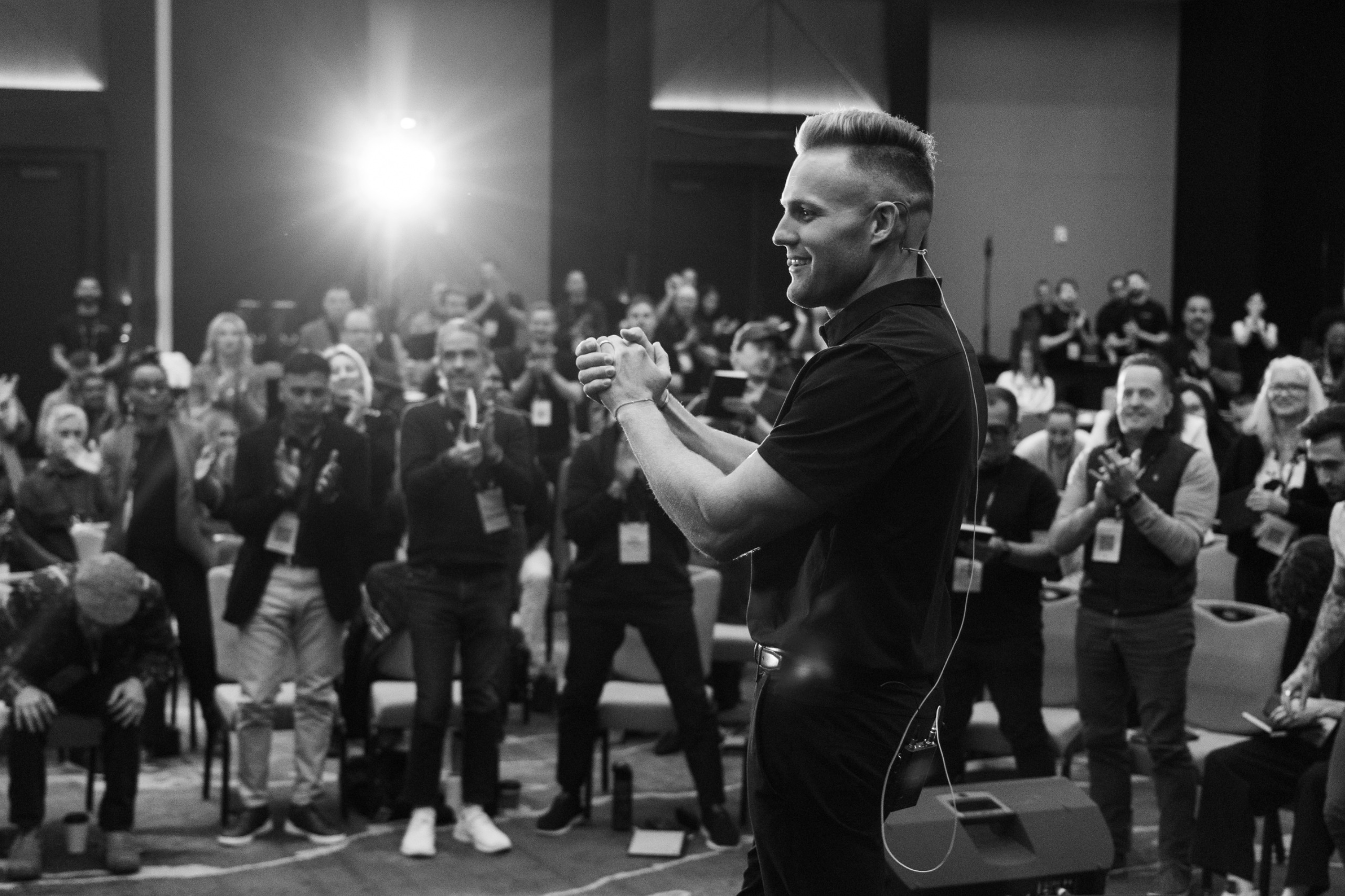 Dr. Benjamin Hardy on stage with the Scaling Live audience