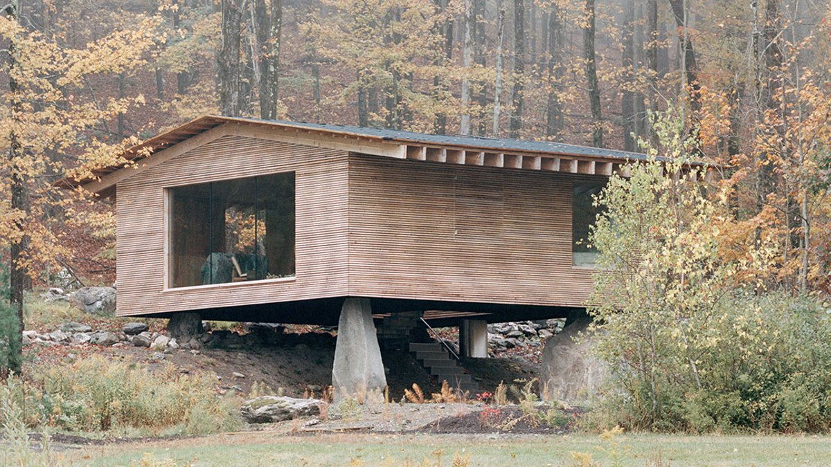 Larch Retreat Floats on 500-Million-Year-Old Boulders Larch Retreat Floats on 500-Million-Year-Old Boulders - forest cabin design
