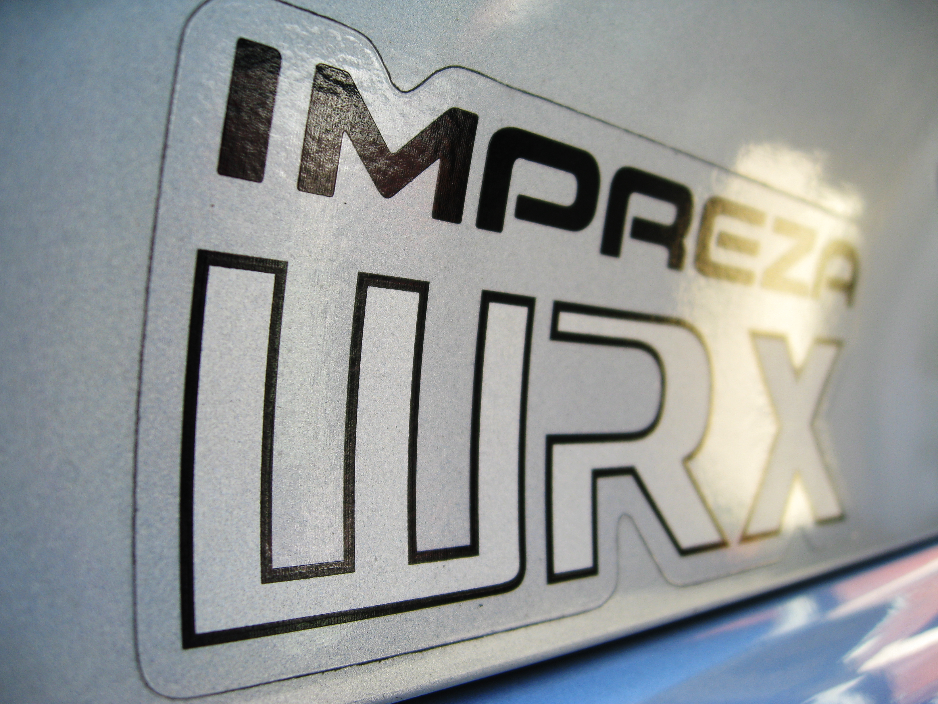 1997 Subaru Impreza WRX badge