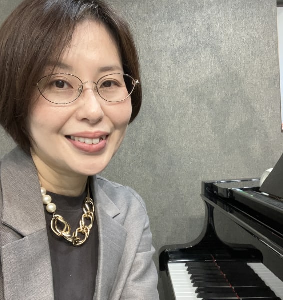臼居　純子