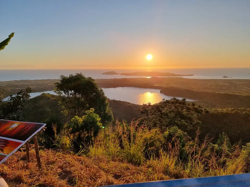 Panoramic view of Mont Passot on Nosy Be with crater lakes and sunset