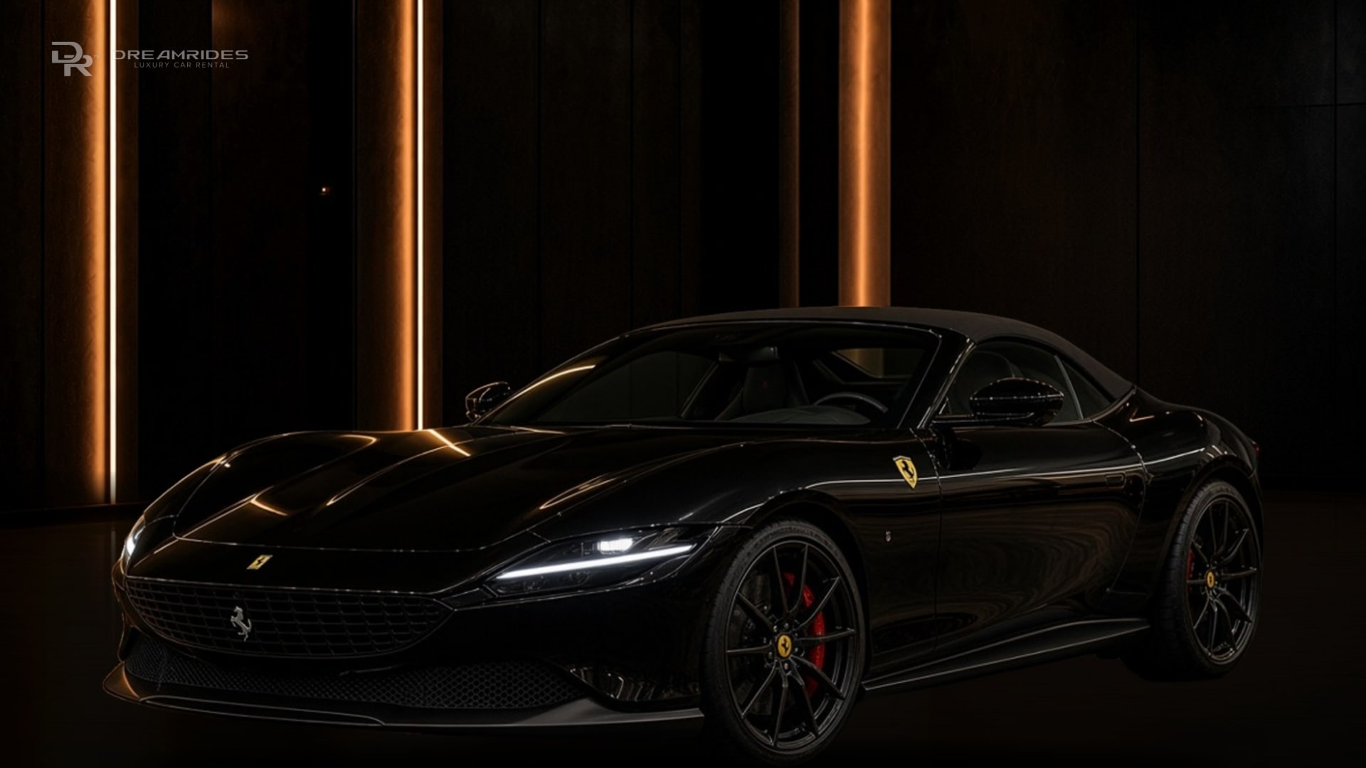 Black Ferrari Roma Spider with the roof down and red brake calipers from the DreamRides fleet in Dubai