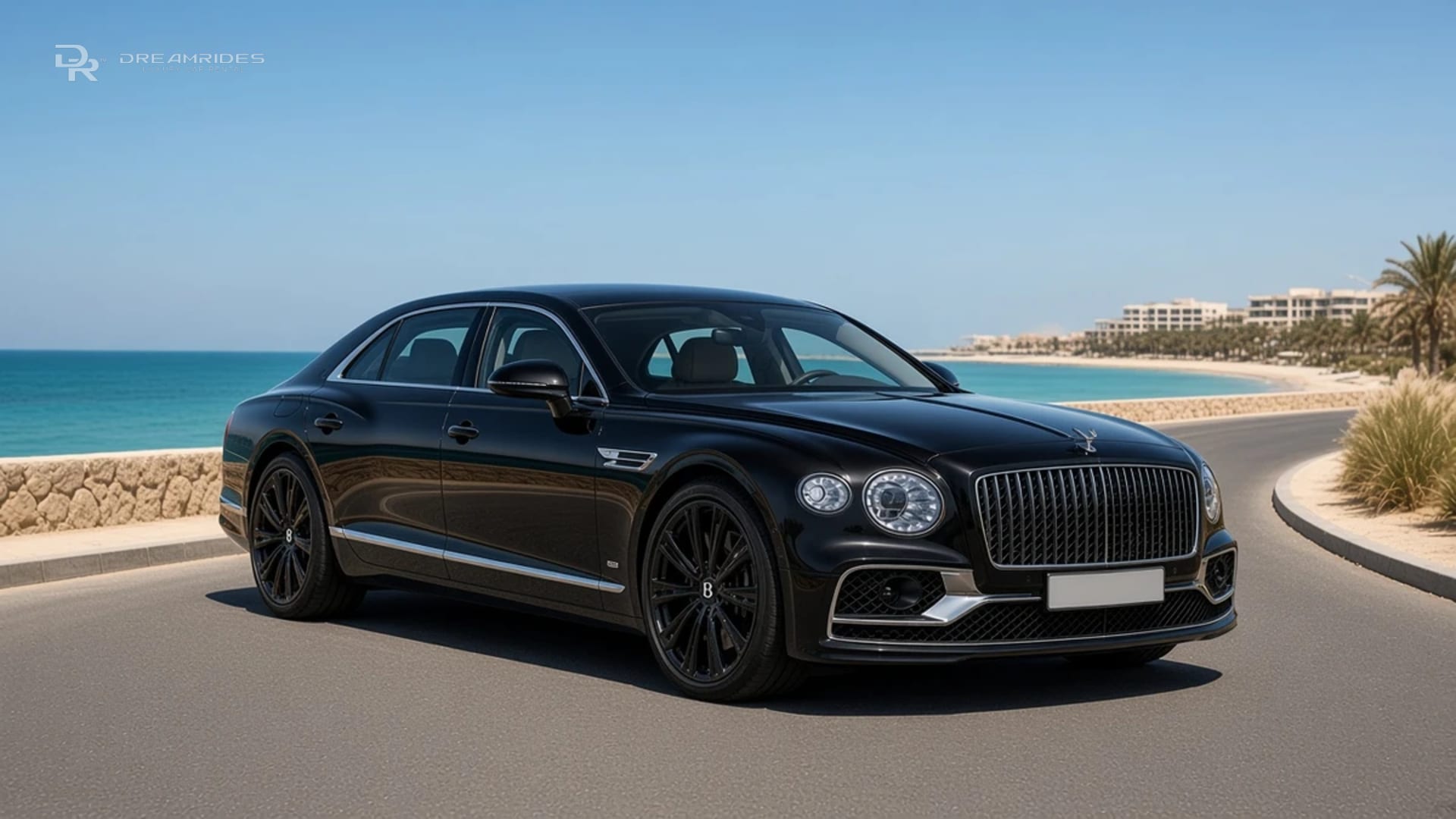 Bentley Flying Spur on a private sea-wall approach to a Jumeira Bay resort in bright late-morning light