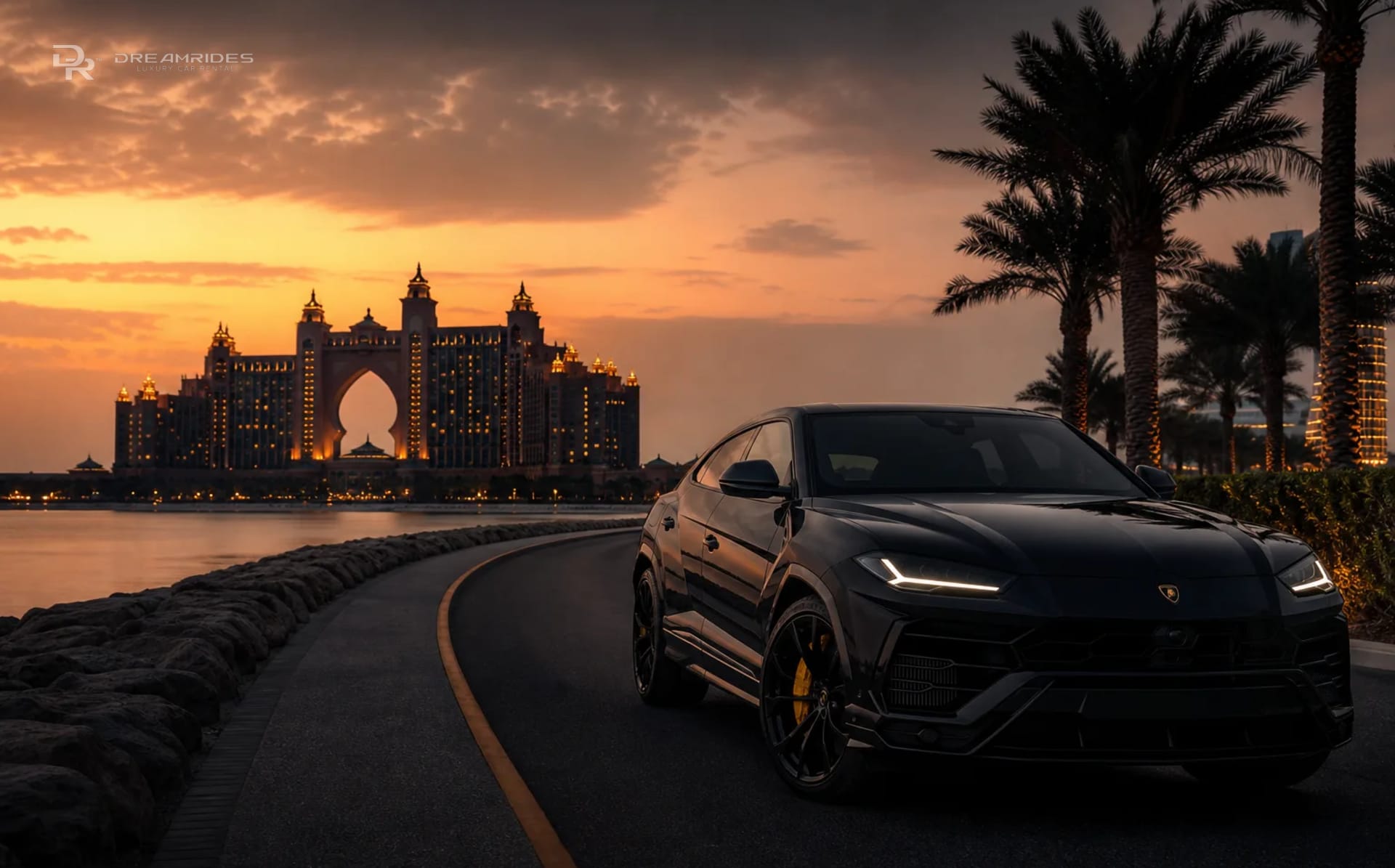 Lamborghini Urus on Palm Jumeirah with Atlantis resort backdrop