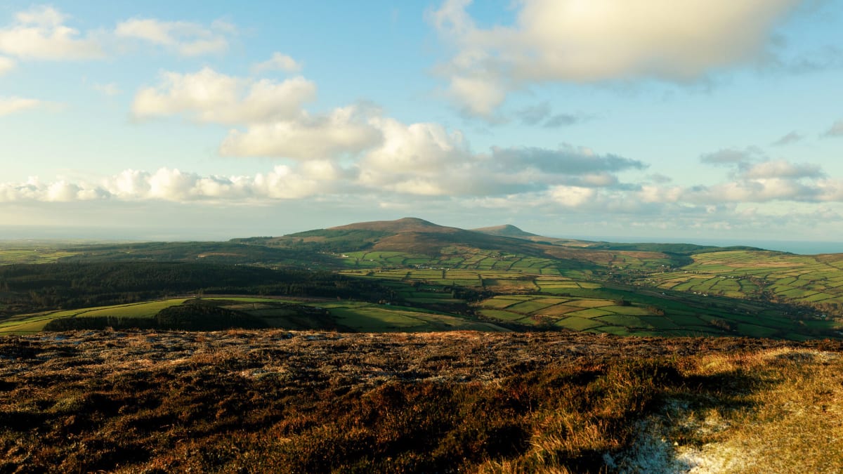 Isle of Man view of grass mountains.
