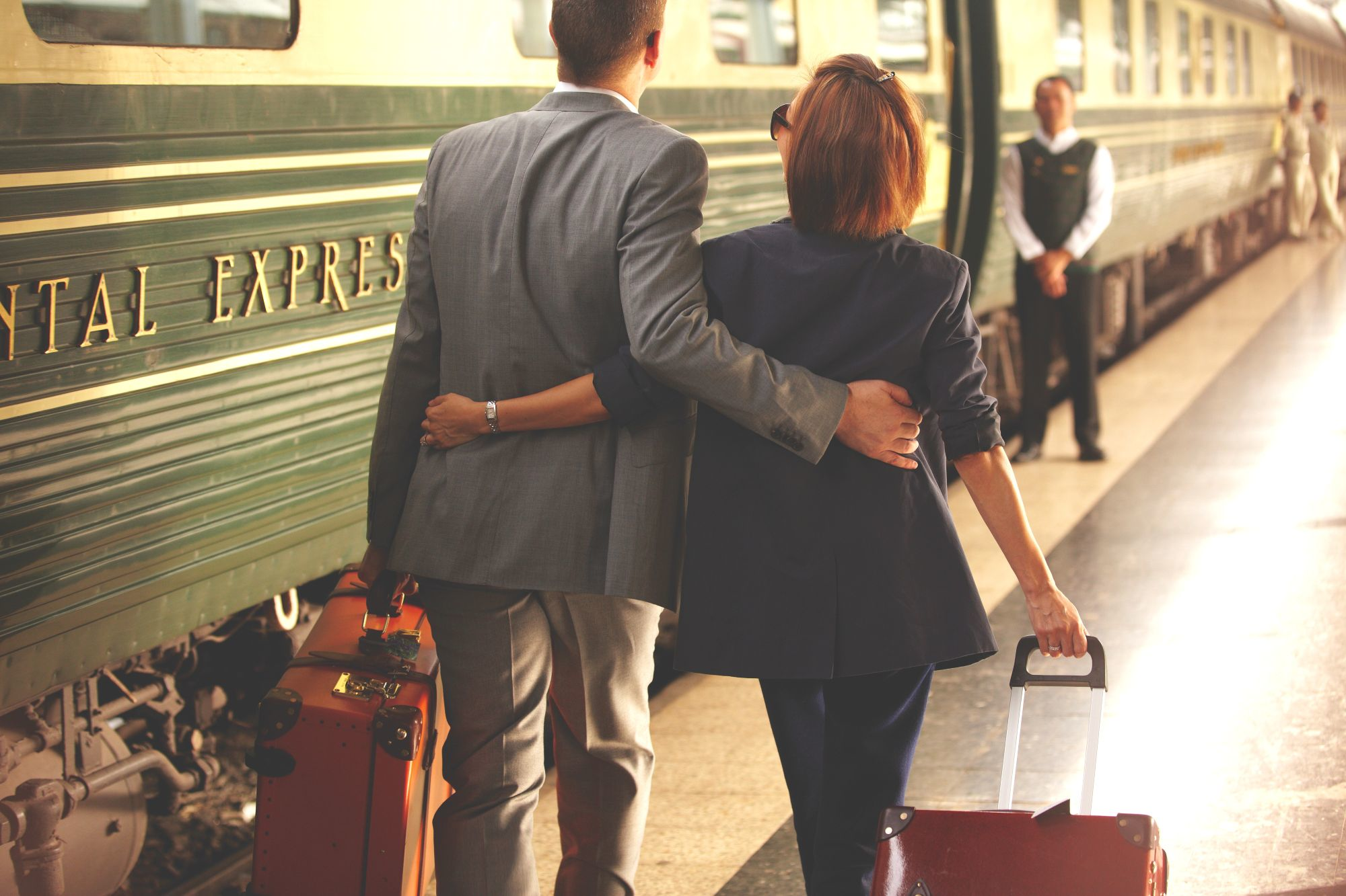 Eastern & Oriental Express_couple on platform arm in arm