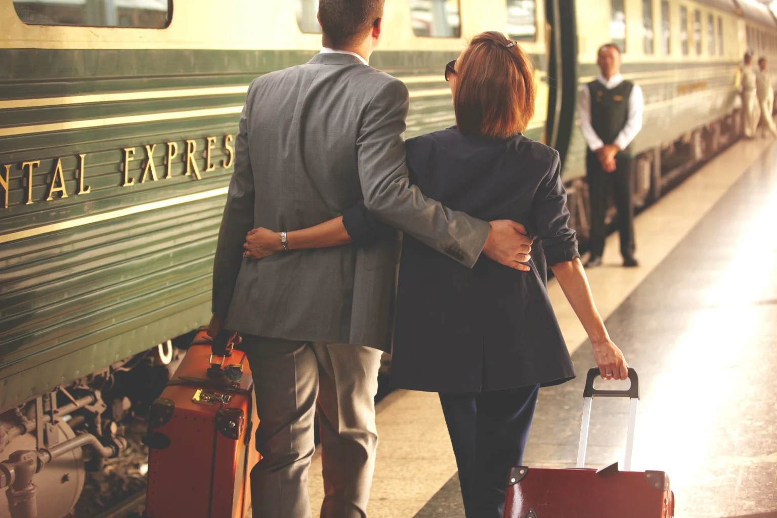 Eastern & Oriental Express_couple on platform arm in arm