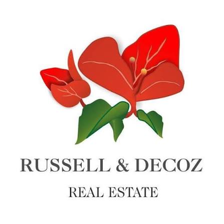 Russell & Decoz Real Estate logo