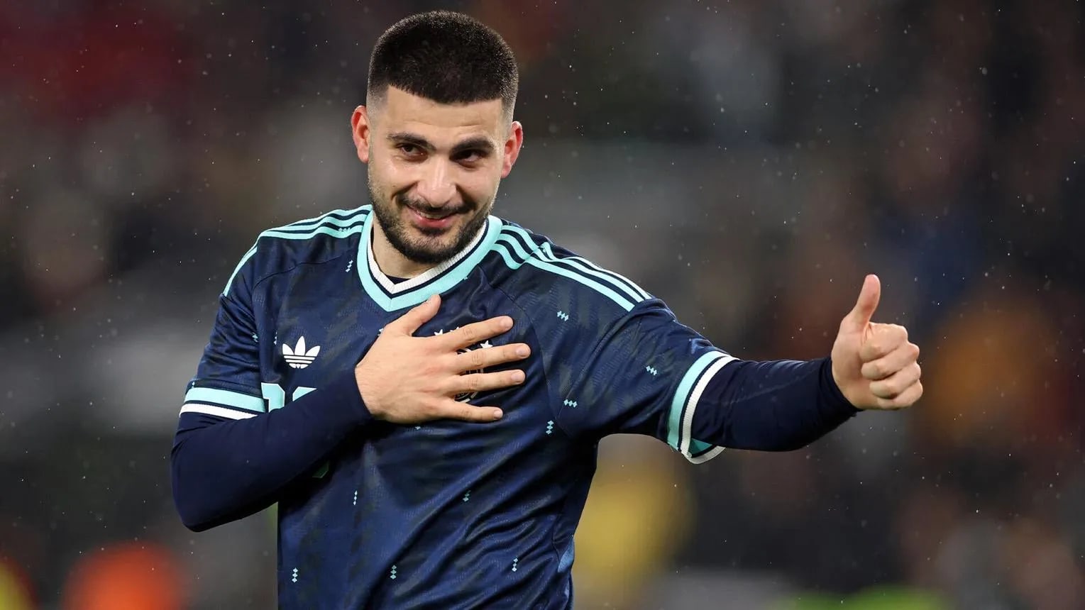 Dimitrios Kourbelis celebrates after scoring for Greece against Germany