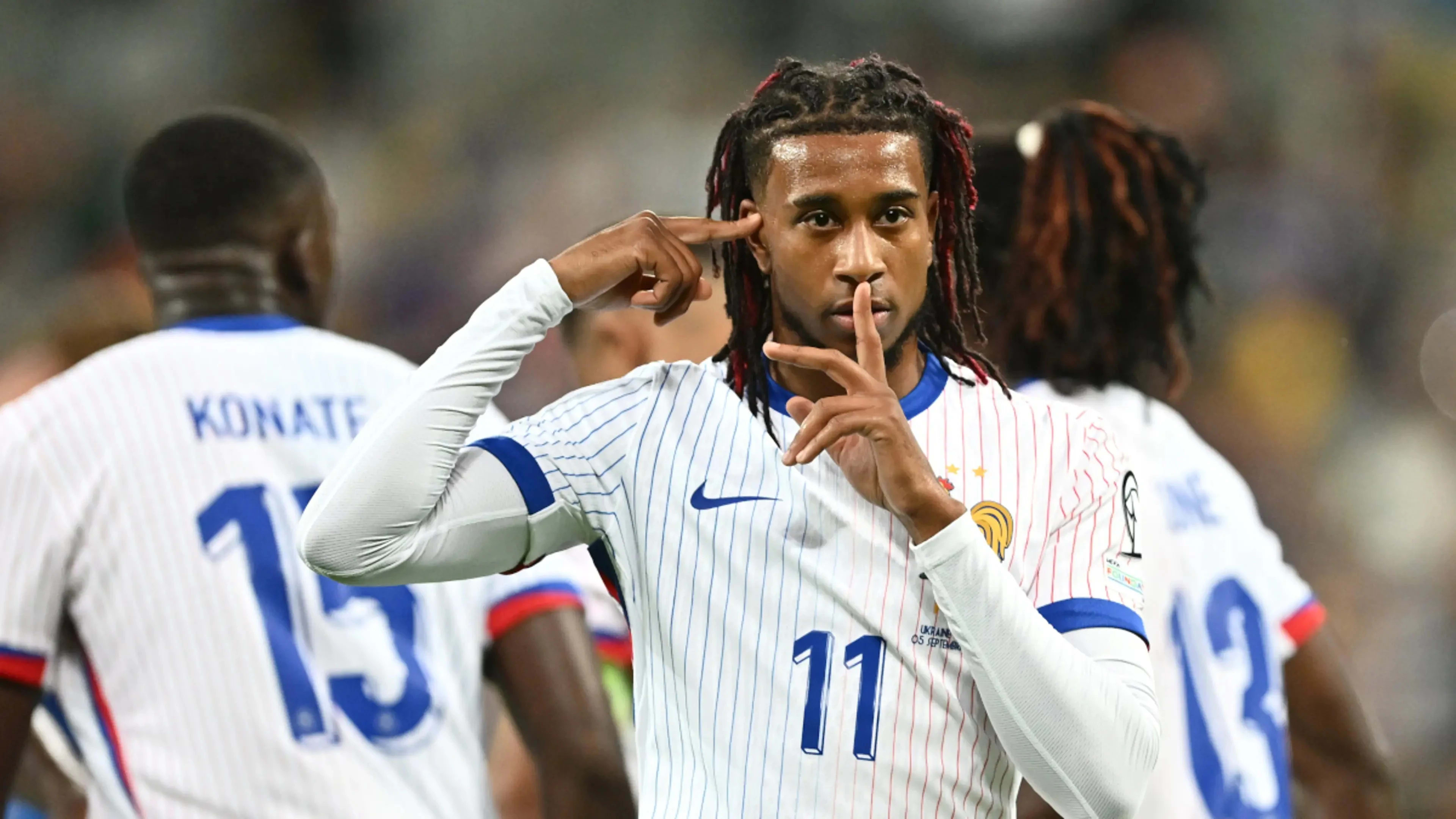 Michael Olise celebrates after scoring for France against Belgium in the UEFA Nations League at the Stade de France