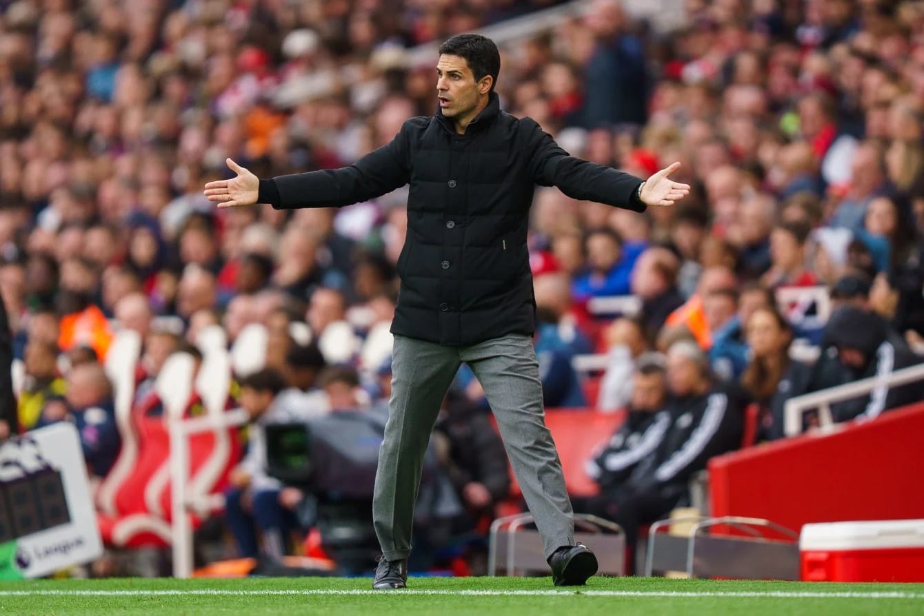 Mikel Arteta celebrates on the touchline as Arsenal manager