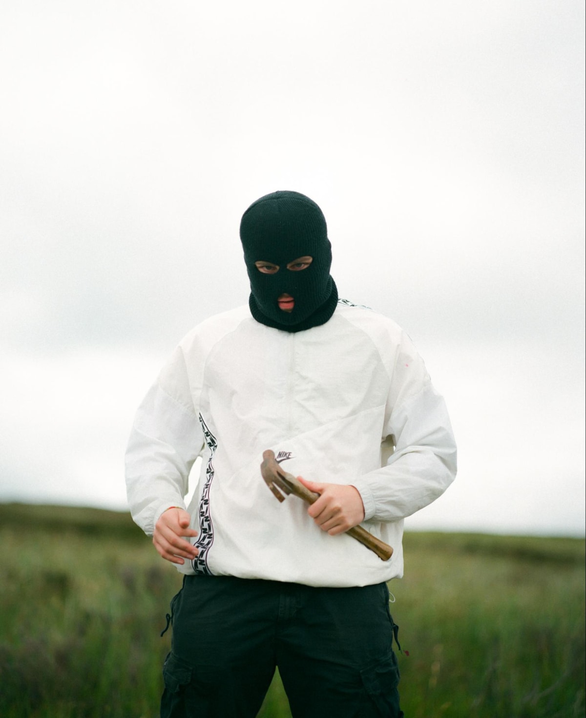 Man in mask with hammer