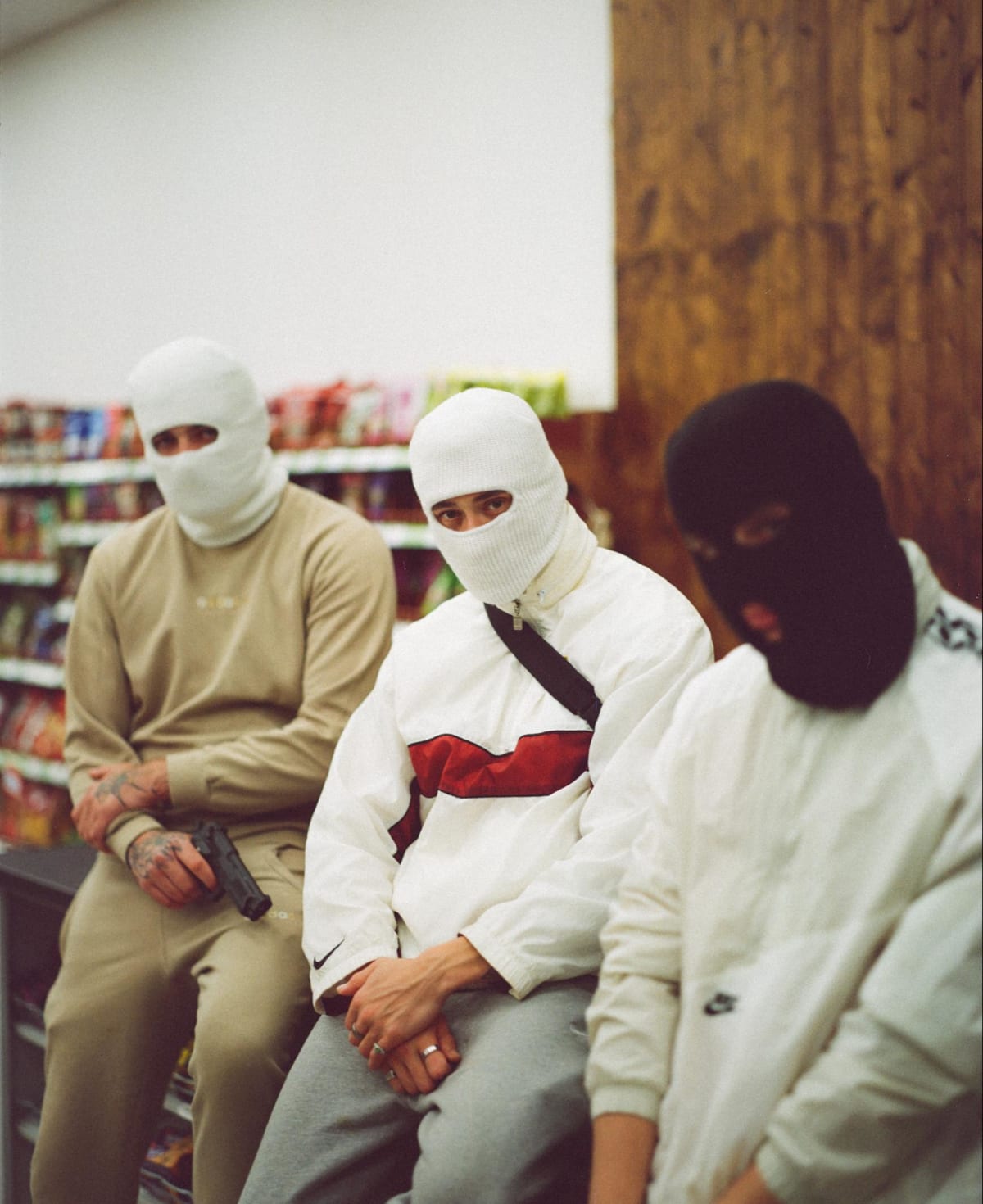 3 men sitting