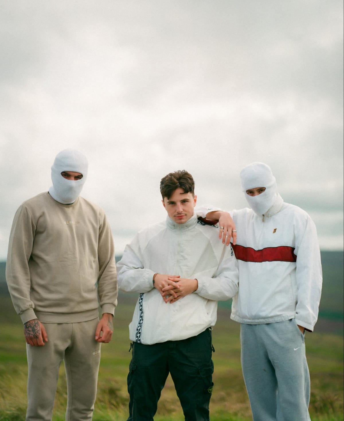 3 men in balaclavas