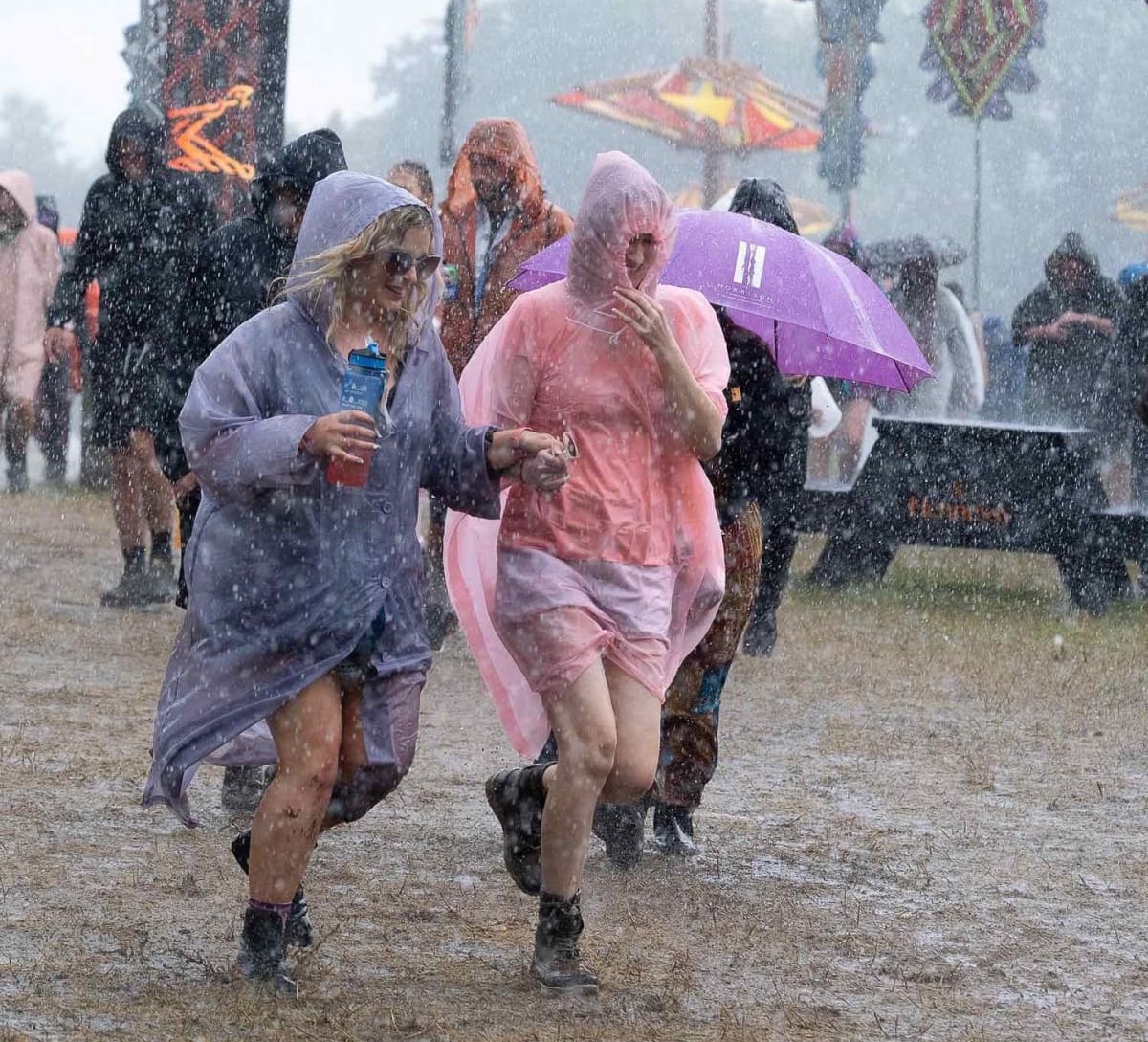 two girls in rain