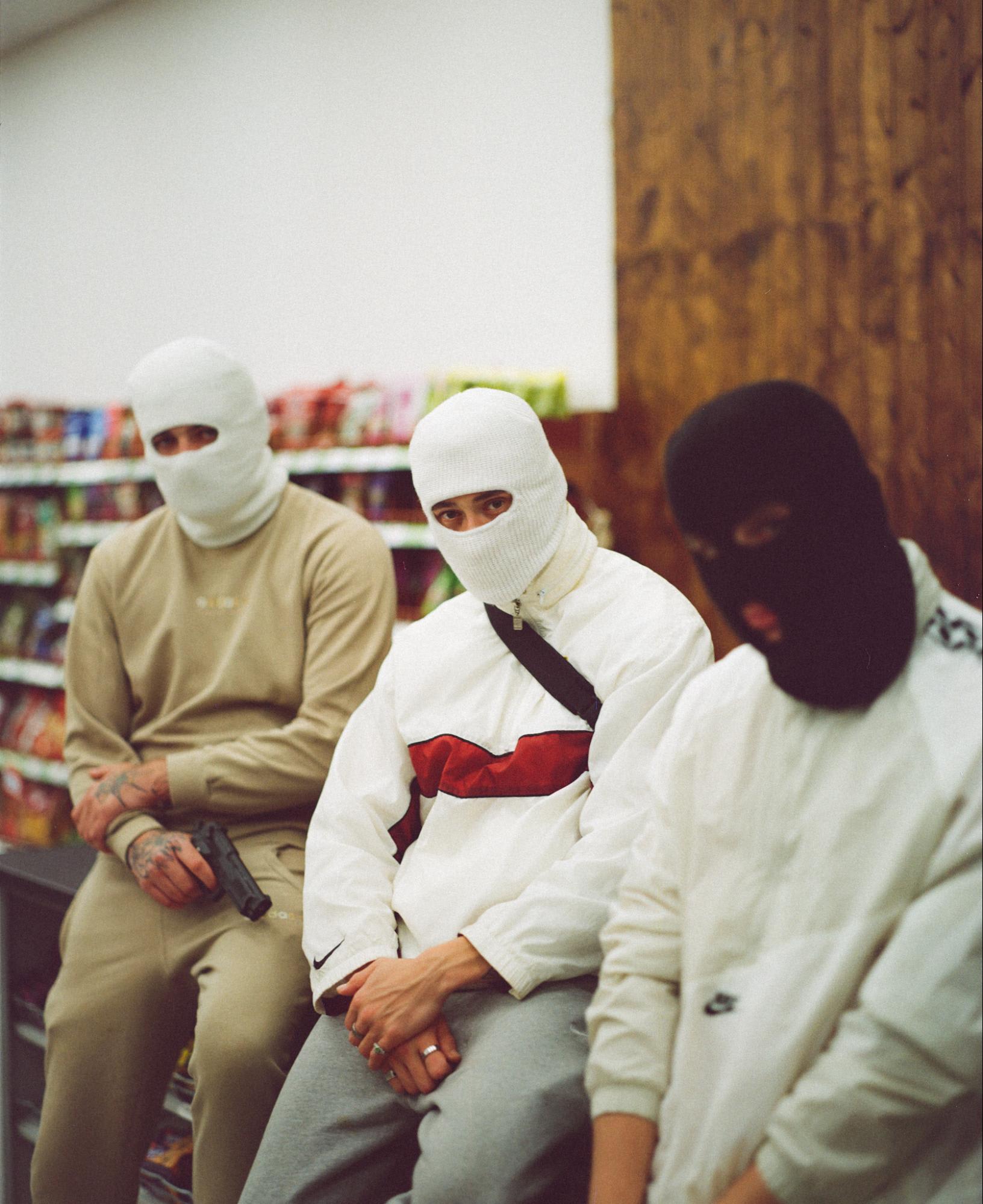3 men sitting