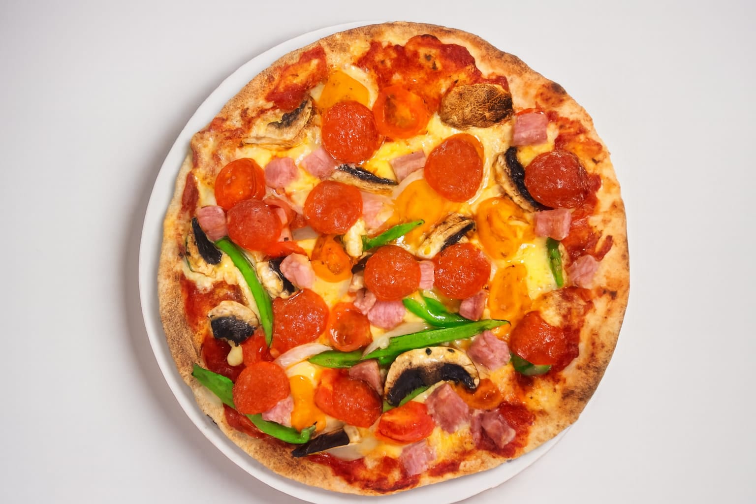 Variedad de pizzas : Mixta, Margarita, pepperoni, camarón, jamón pepperoni