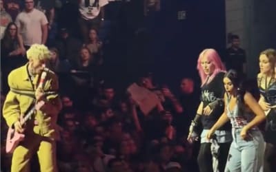 Machine Gun Kelly Fan Falls Through Opening In Stage