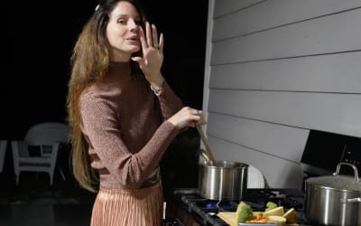 Watch Lana Del Rey Put Her Head in an Oven in “White Feather Hawk Tail Deer Hunter” Video