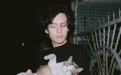 “Never Any Calm Before the Rain” — Julian Ash Descends into Omnihell and Finds Beauty in “Extreme Suffering” — Post-Punk.com