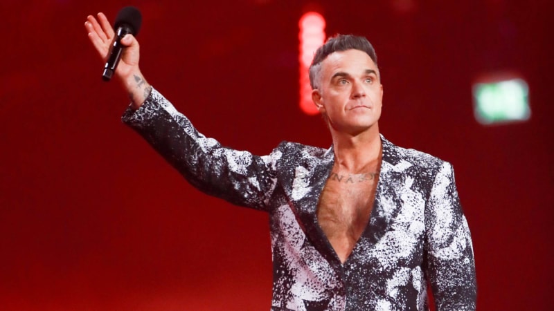 Watch Robbie Williams lead Ozzy Osbourne tribute at BRITs 2026 with ‘No More Tears’