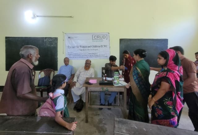 Women and older patients queue to be examined at the same camp.