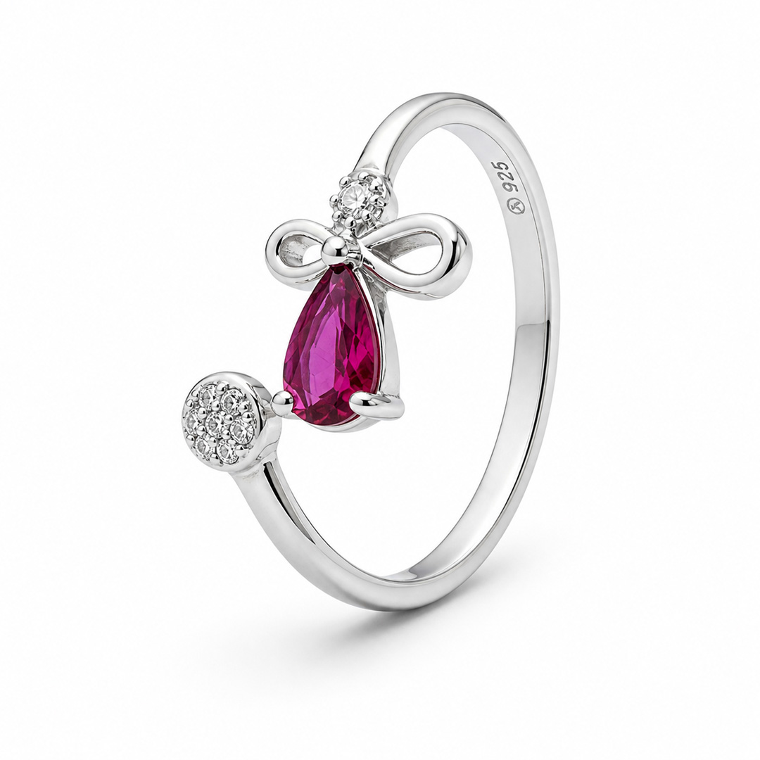 Ribbon Rose — bow and pink stone silver ring