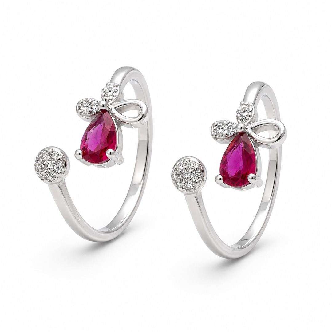 Ribbon Rose — bow and pink stone silver ring