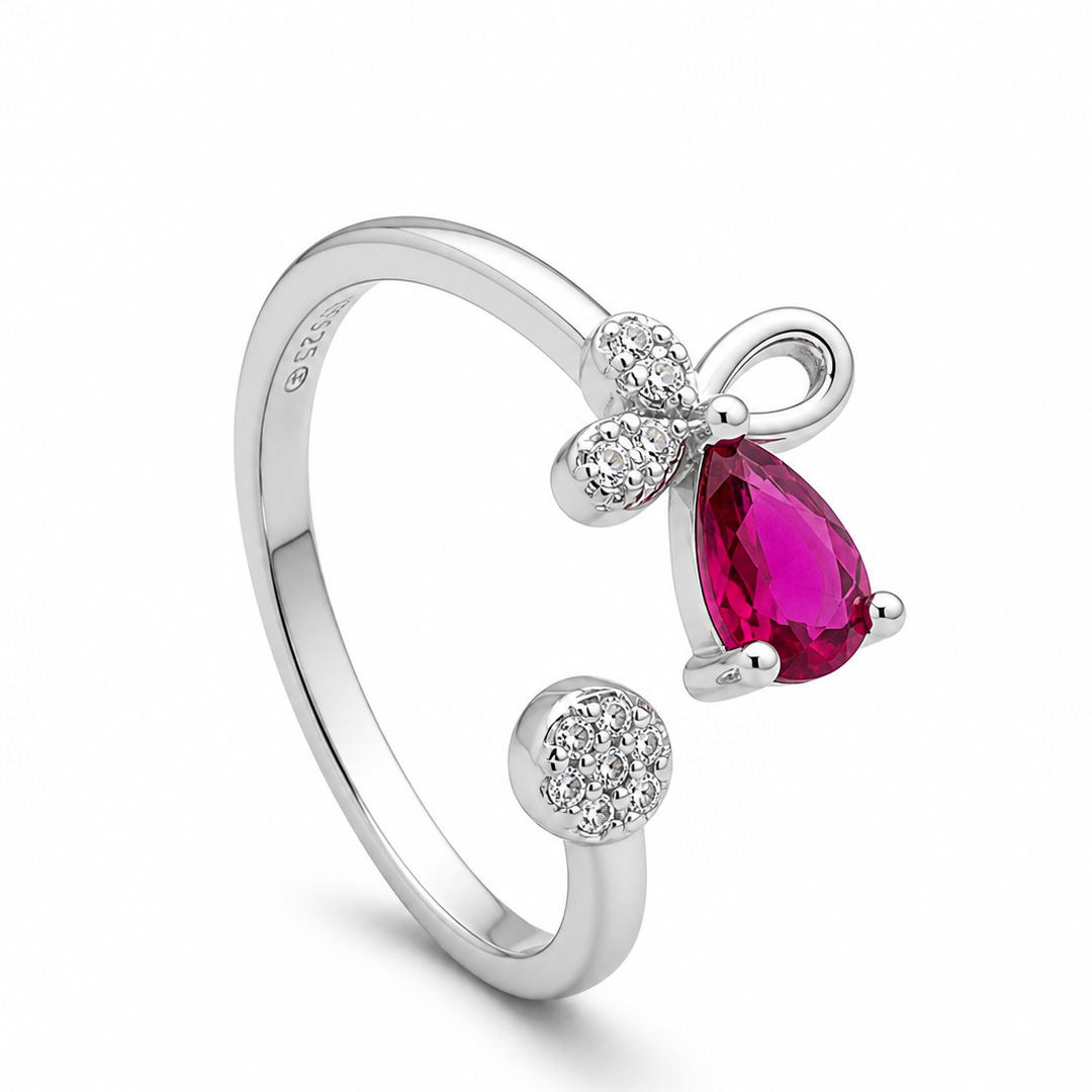Ribbon Rose — bow and pink stone silver ring
