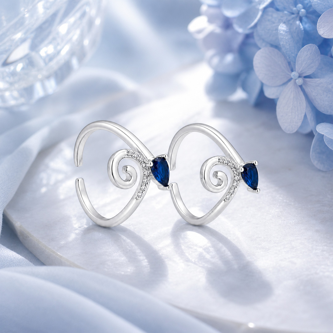 Ocean Swirl — wave and blue stone silver ring