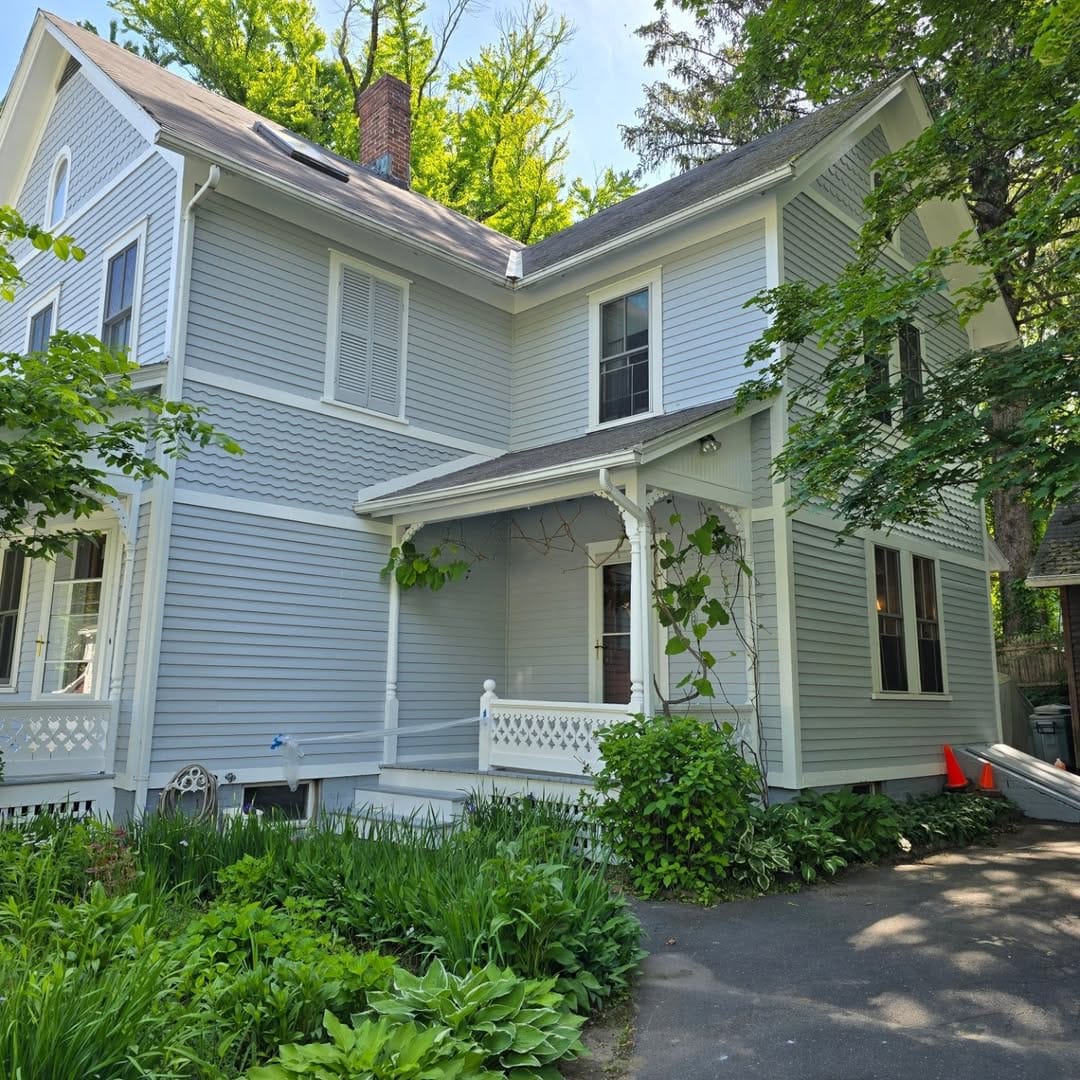 Exterior Restoration: Siding & Porch Refinishing - after