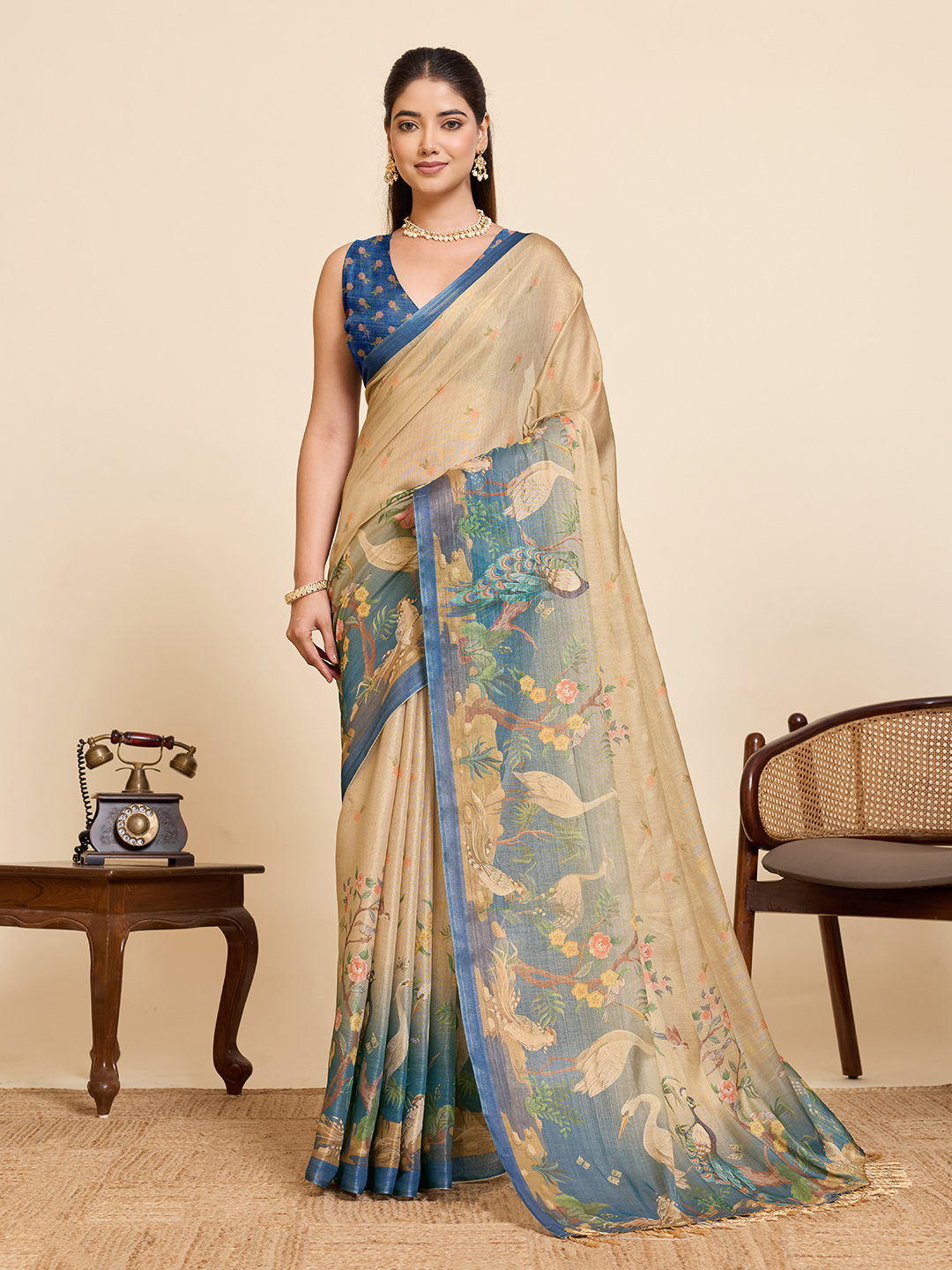 Breathable printed Arya linen saree with golden zari weave border styled for office and festive transition