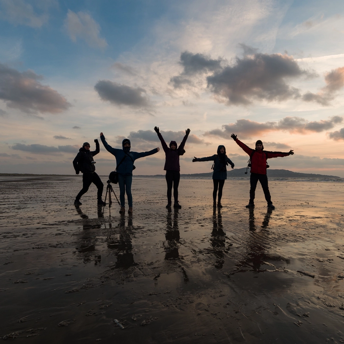 Group of photographers on the beach