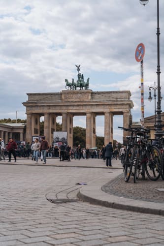 An image of a travel and street engaged in walking in a landmark.