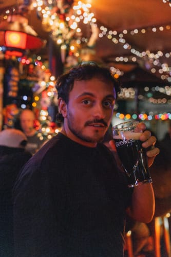 An image of a drink, self-portrait, and lifestyle engaged in dancing.