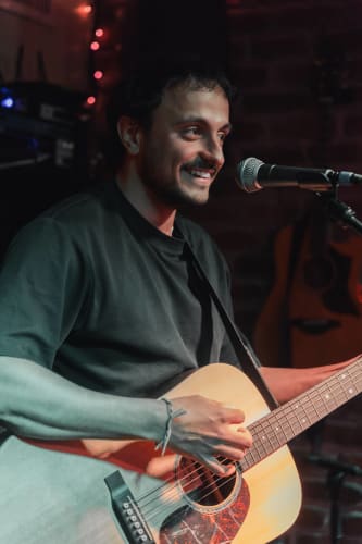 An image of a urban engaged in performance with a happy and joyful feel.