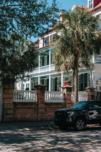An image of a street, urban, architecture, and gardens in an outdoor setting.