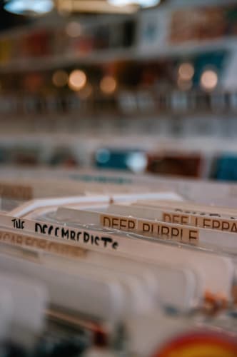 An image of a drink and conceptual engaged in music in a cafe.