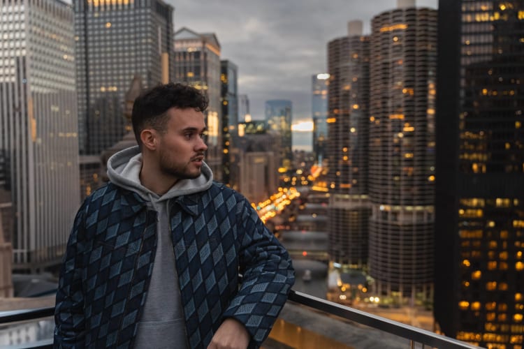 An image of a urban and cityscape engaged in music in a sunset.