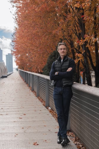 An image of a urban, self-portrait, and travel engaged in walking in an outdoor setting.