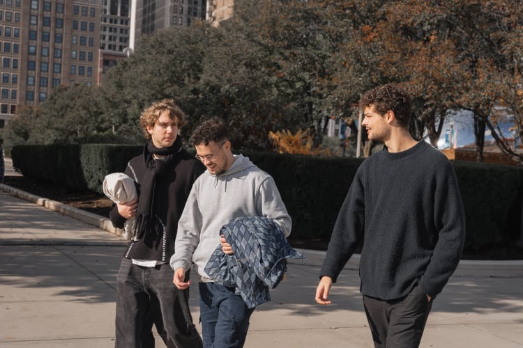 An image of a family engaged in walking with a energetic and happy feel.