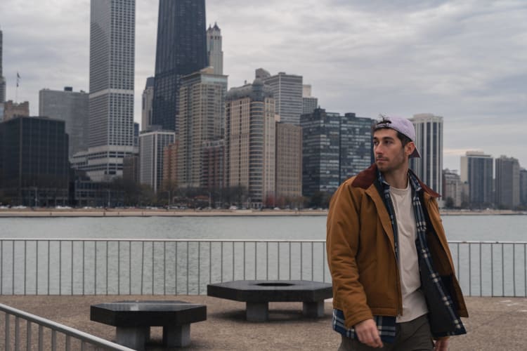 An image of a urban, cityscape, and travel engaged in walking with a introspective atmosphere.