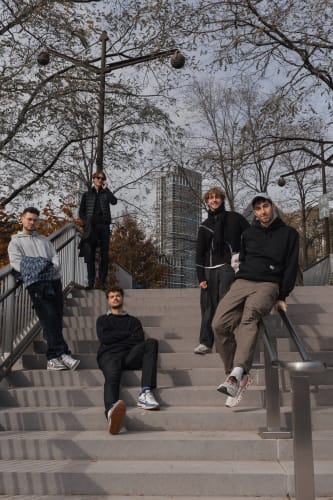 An image of a conceptual and art engaged in music in an outdoor setting.